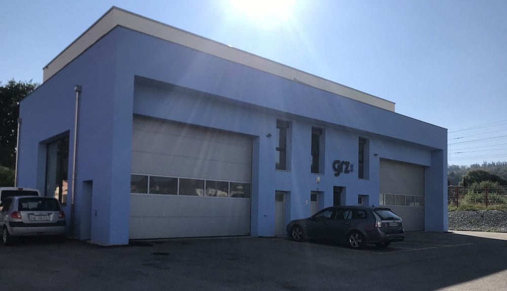 GRZ’s factory location until 2023. PV panels have been added to the roof immediately after commissioning, which enabled to cover a significant part of the energy consumption locally.